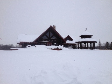 snow covered cabin small